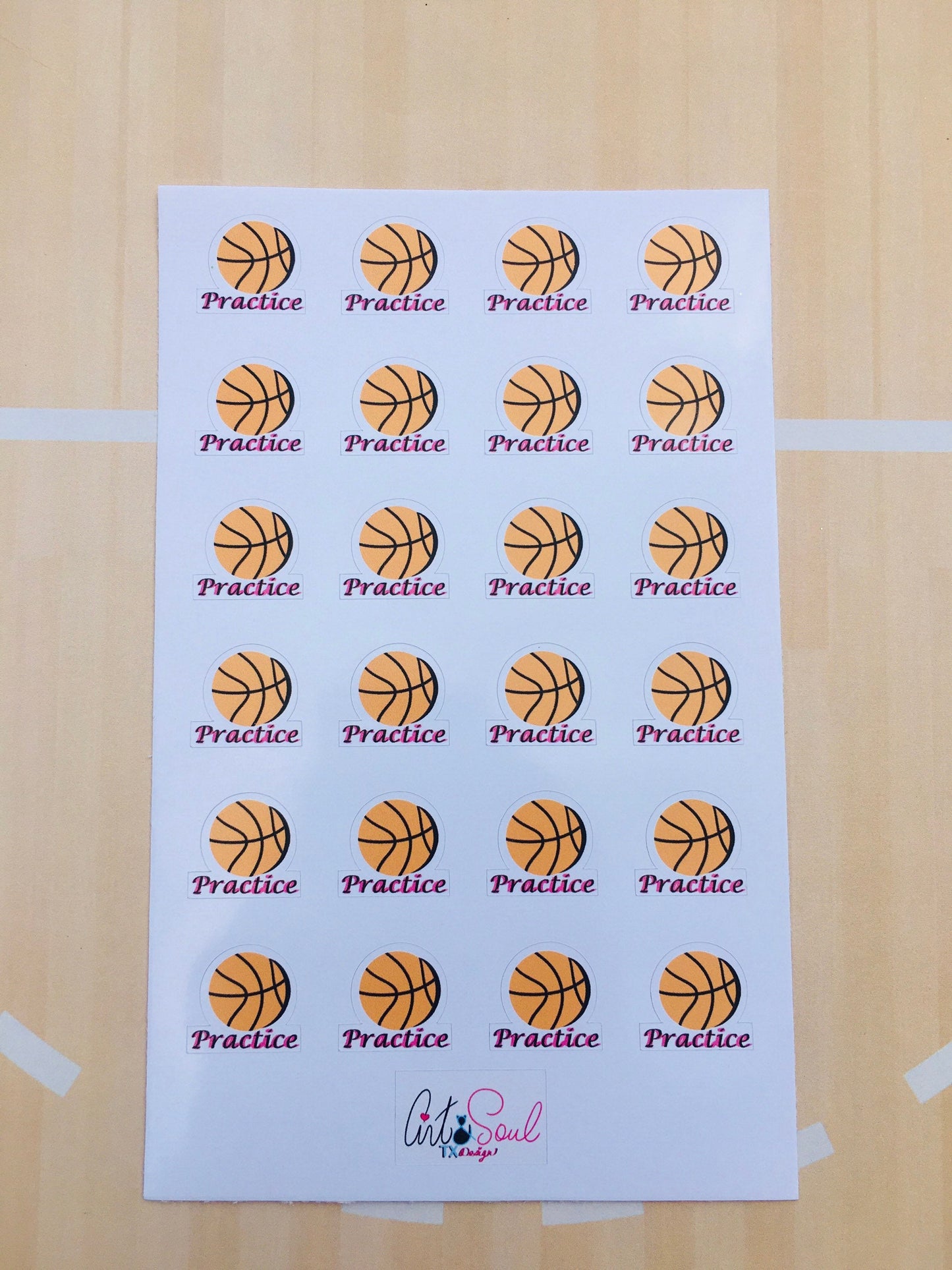 A close-up of the Basketball Practice sticker sheet on top of a basketball court background.