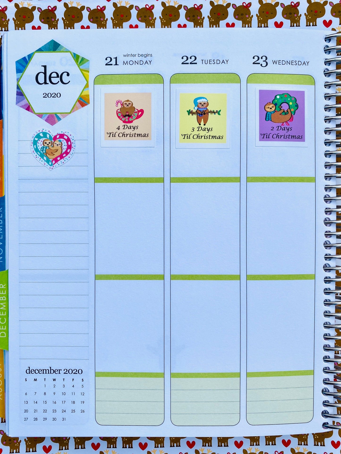 Days 4 - 2 of Sloth Countdown to Christmas stickers in a life planner.