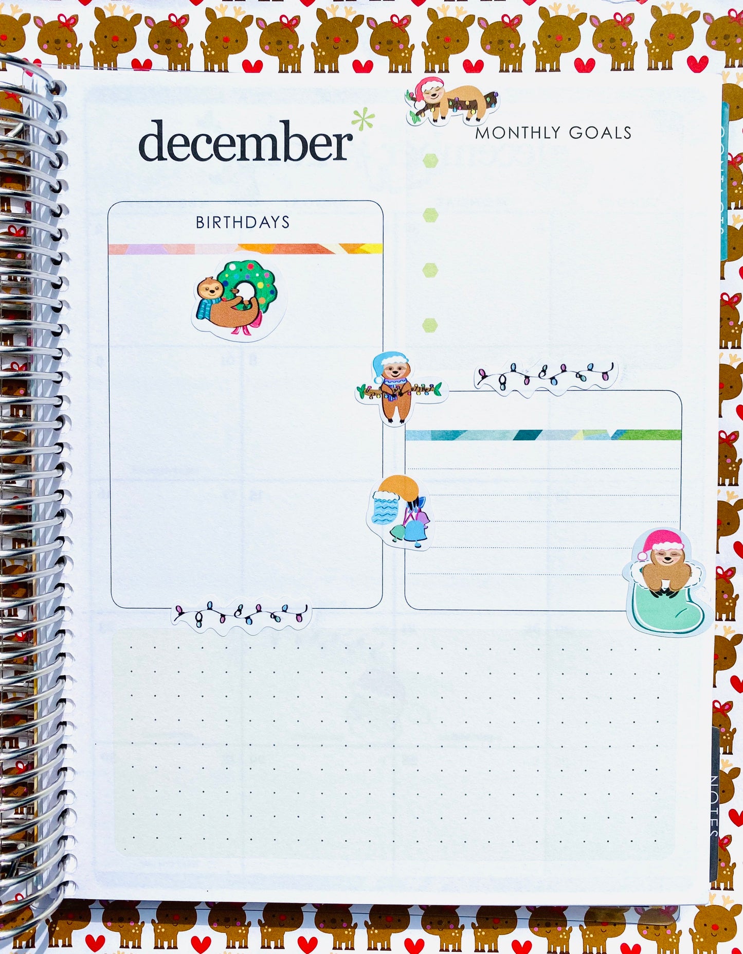 Sloth Christmas planner stickers in an Erin Condren life planner.