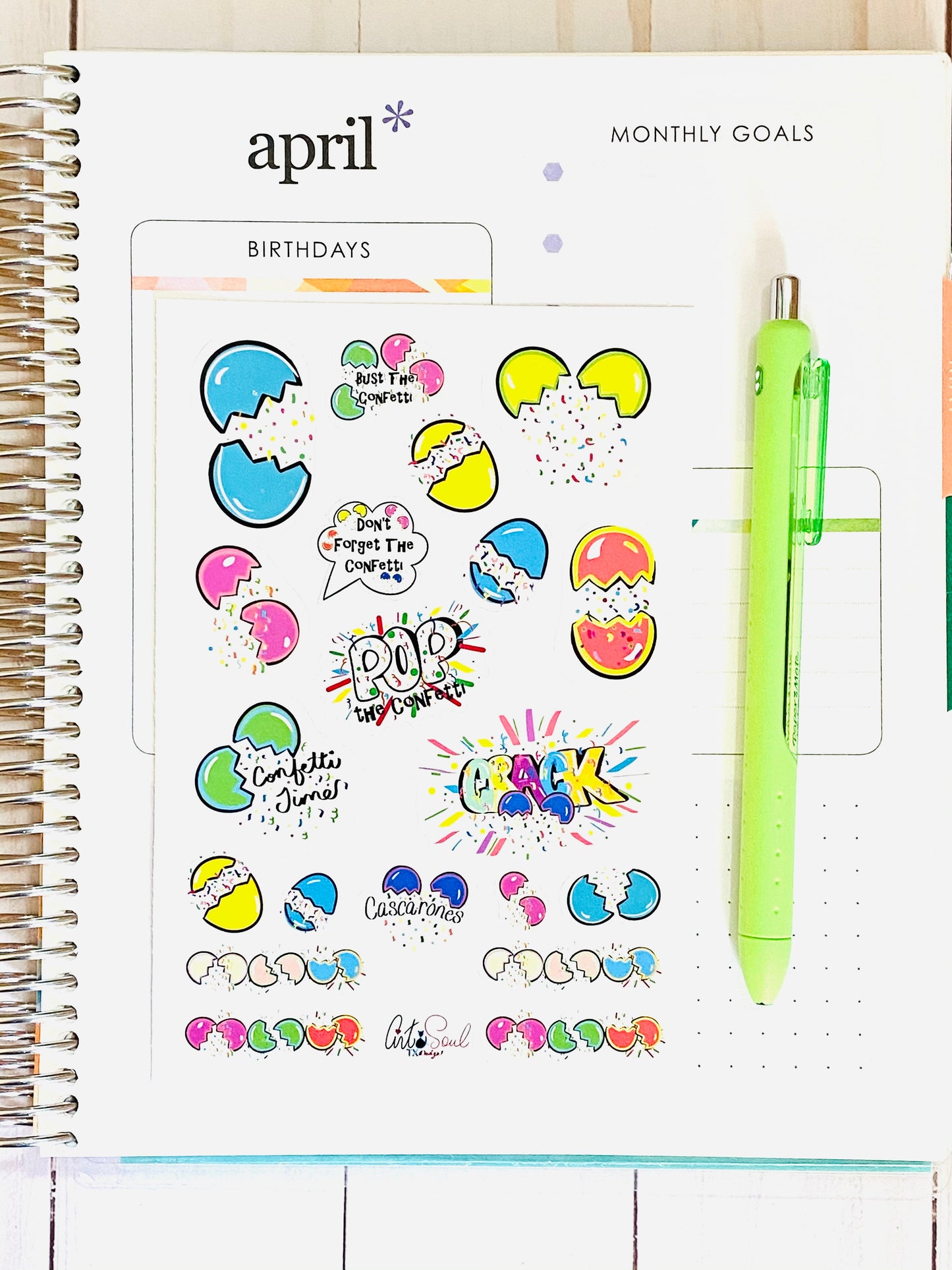 A sheet of Confetti Celebration stickers n an Erin Condren planner